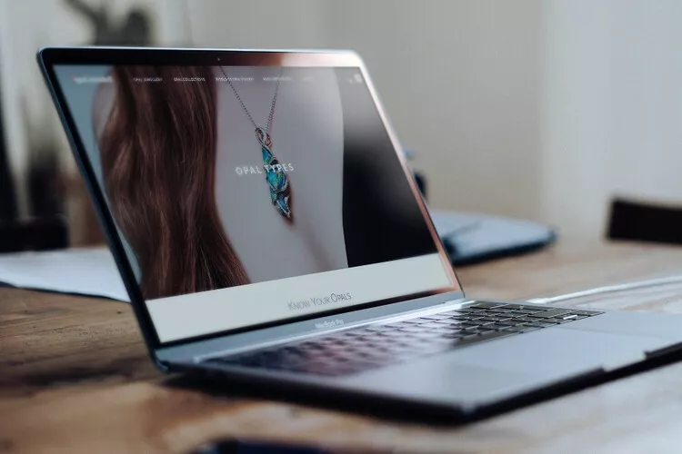 Opal Minded online store – jewelry website on a laptop